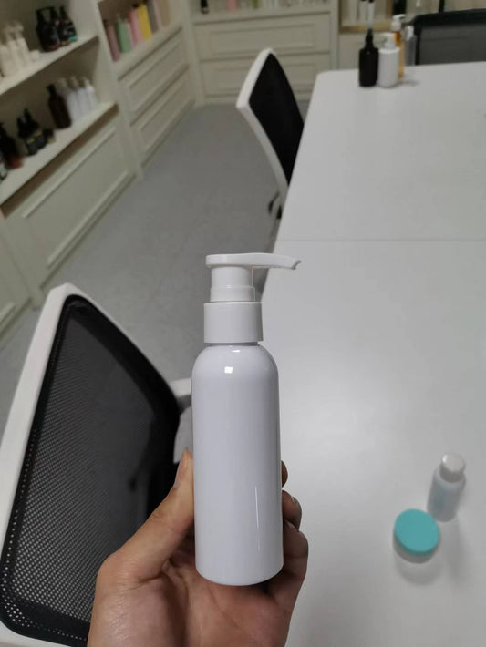 White Round Bottle with Treatment Pump 100ml