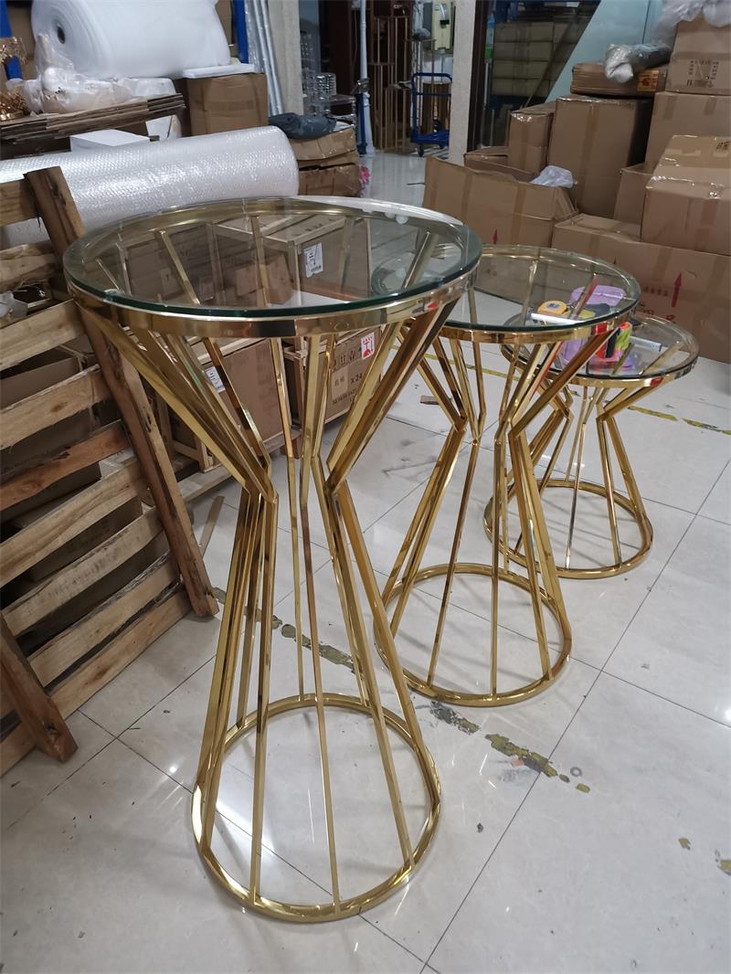 party rental gold stainless steel base glass top